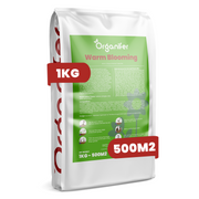 A 1 kg bag of Organifer Warm Blooming fertilizer, featuring a white bag with a green label and red promotional badges indicating '1KG' and '500M2'.